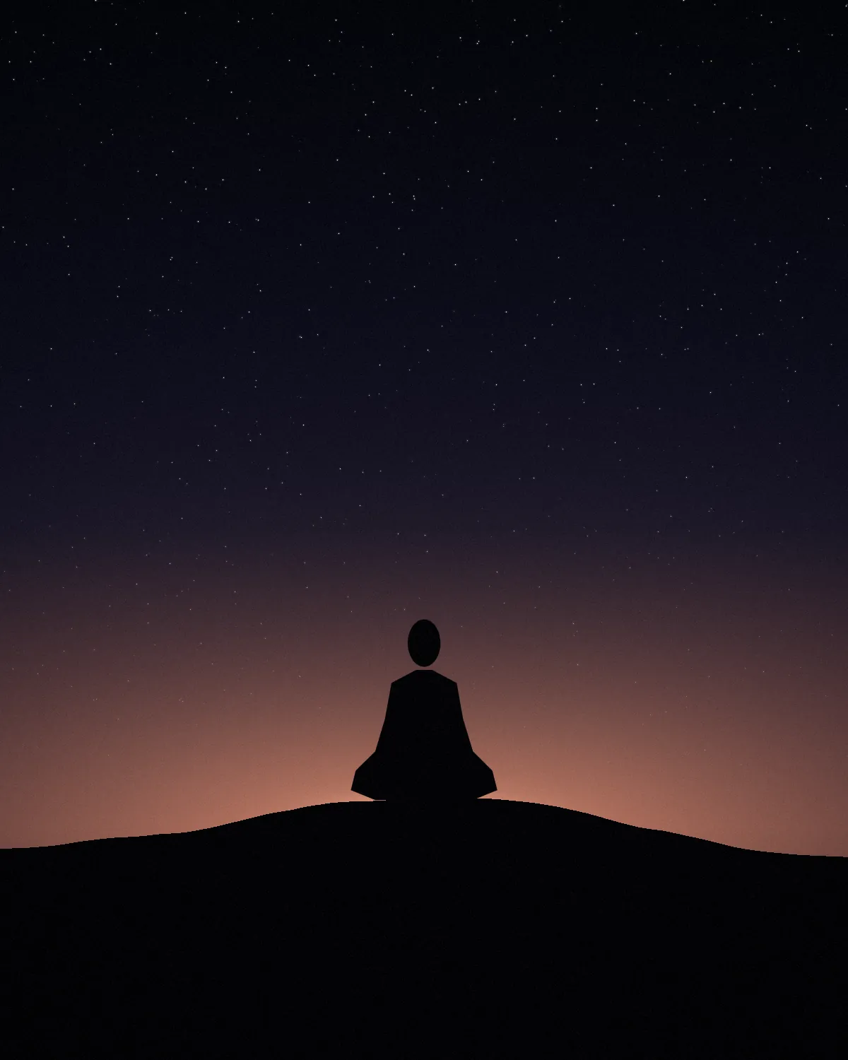 A figure seated in meditation on a hill at dawn